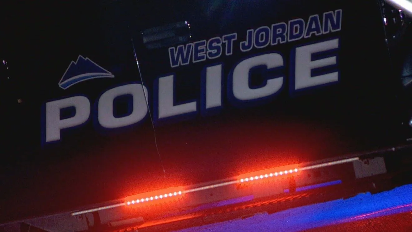 Police lights near a Utah roadside after a cross-state child kidnapping arrest