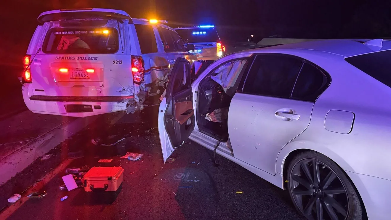 Marked Sparks police vehicles after a late-night crash on Pyramid Way