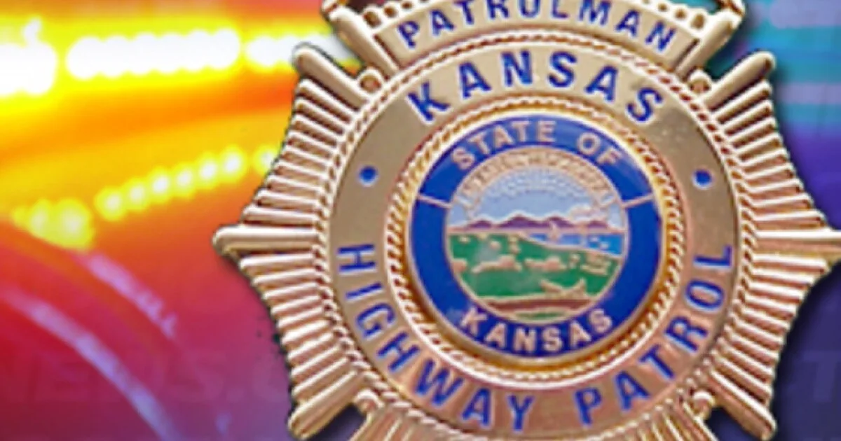 Police and emergency crews at a fatal crash scene near an interstate ramp and ditch